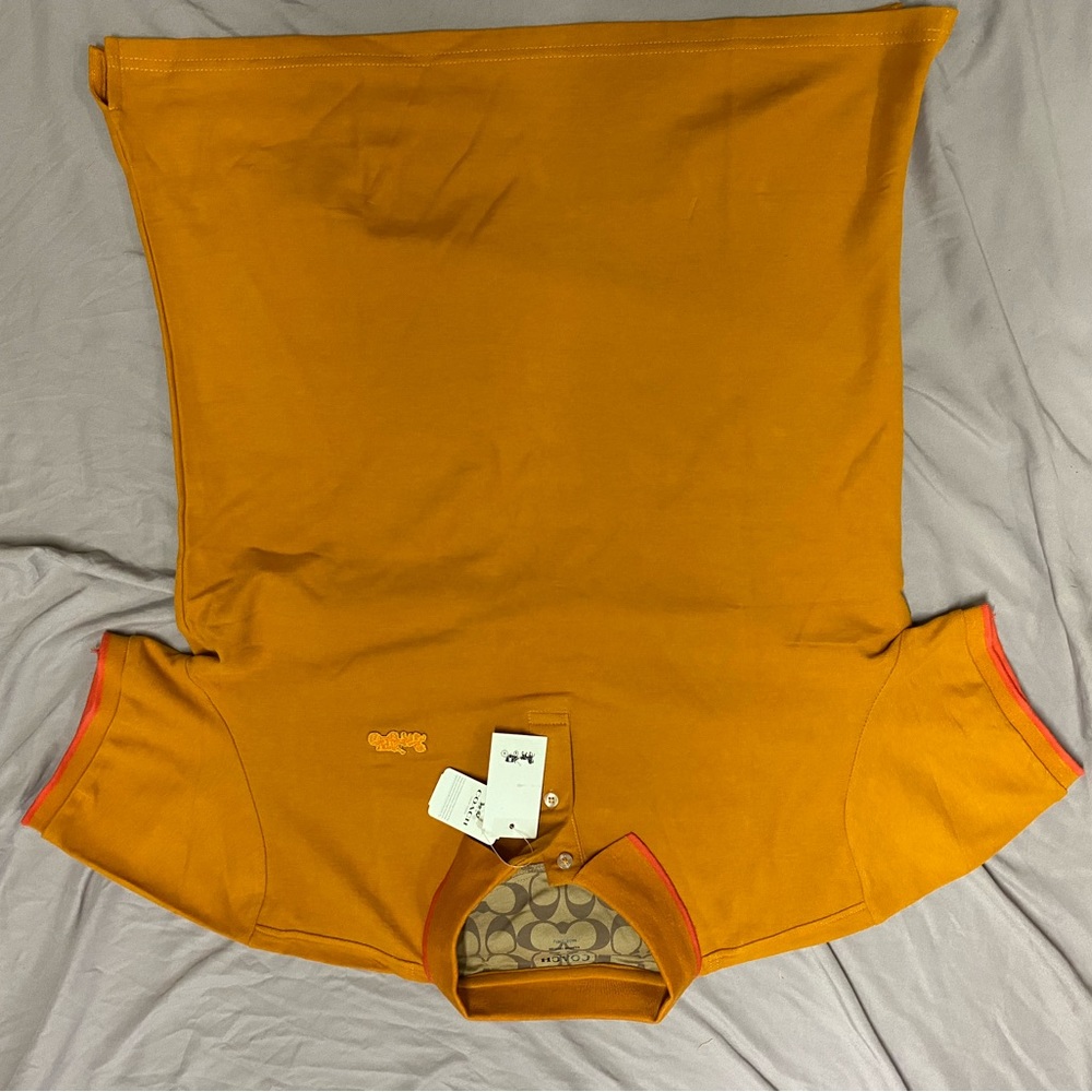 Men’s coach polo brand new with tags size XL citrus color